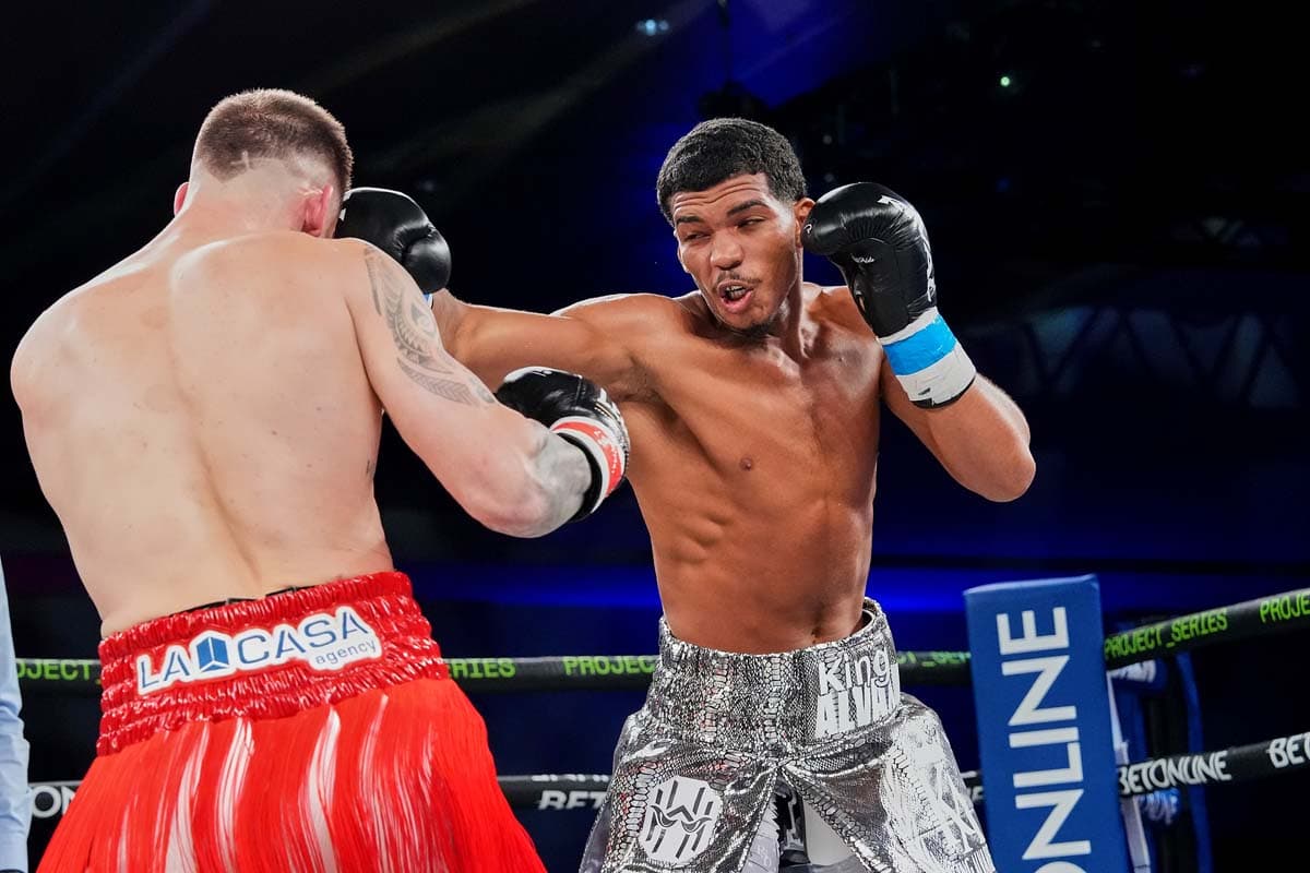 Ronny Alvarez lands a jab on Narciso Carmona during their bout