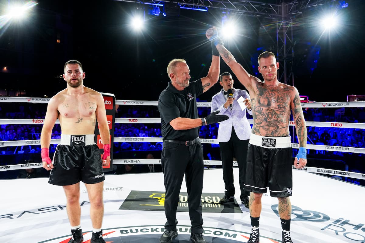 Timothy Randall has his hand raised by the referee in victory over Ahmad Muhtaseb